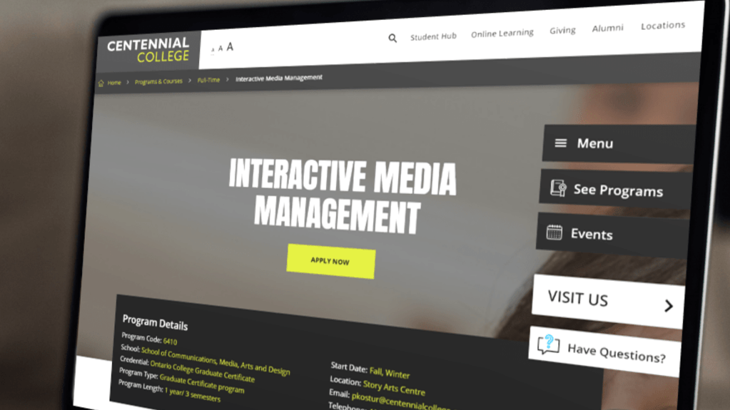 An image of a laptop that has the Centennial College website on it.